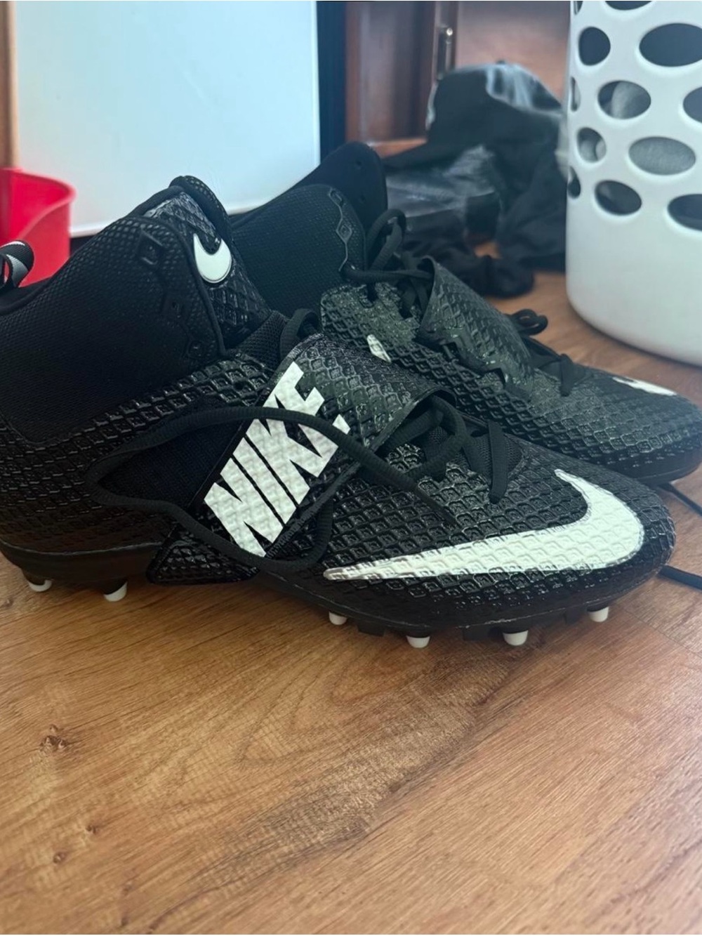 Nike Black Cleats with White Swoosh